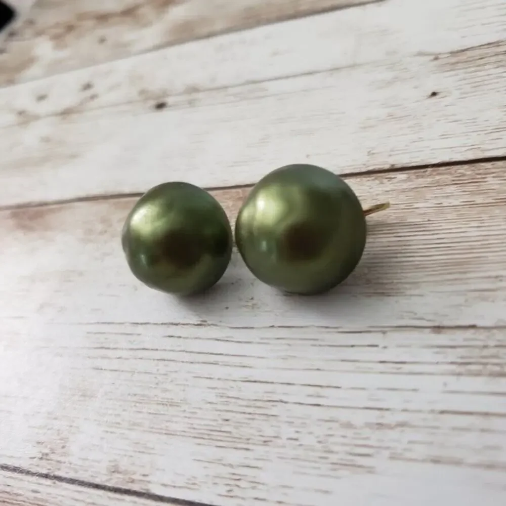 Vintage Richelieu Clip On Earrings - Uneven Domed Circle Metallic Green